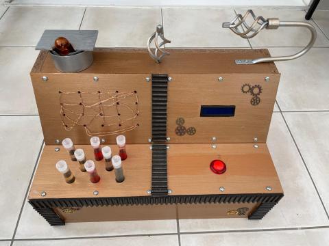 A wooden box with test tubes, screen, lights, and a big red button