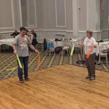 People learning circus skills