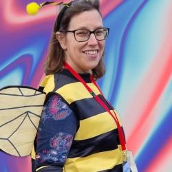 Dr Pepper in a wasp outfit with a psychadelic background